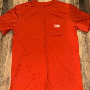 The north face short sleeve shirt; size medium